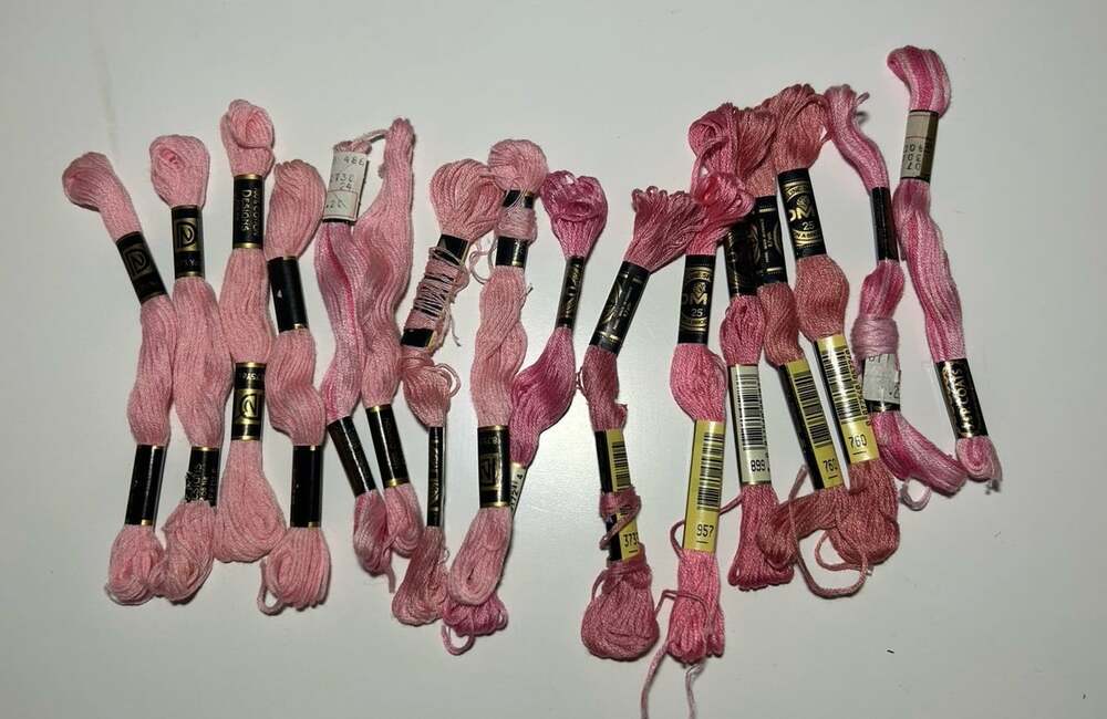 16 Skeins of assorted embroidery threads DMC ,DN light pink and medium READ